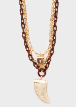MULTI-STRAND NECKLACE WITH OVERSIZED BROWN HORN