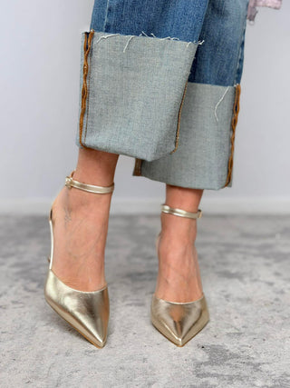 Décolleté pelle laminata