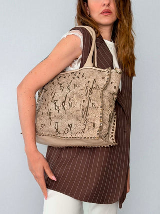 Laser-cut leather Primula bag